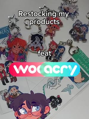 A post by @ayrinkk on TikTok caption: collab with @WooacryOfficial love their products #artproduct #convention #keychains #stickers #restock #unboxingvideo #unboxing #digitalart #arcane #tgcf 