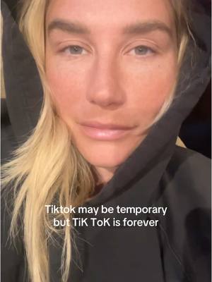 A post by @kesha on TikTok caption: ✌️🖤