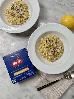 A post by @emmanuelduverneau on TikTok caption: Warm up this winter season with Lemon Parmesan Pastina made with @barillaus Classic Pastina, the perfect ingredient to share with those you love. #BarillaUS #AD Recipe: 1 cup @BarillaUS Classic Pastina 1 Tbsp olive oil 4 garlic cloves, minced   1/4 tsp red pepper flakes zest from half a lemon 1 Tbsp lemon juice 3 cups chicken broth 1 tsp salt 1/4 tsp pepper 2 Tbsp butter 2 Tbsp parsley 1/4 cup Parmesan cheese -In a sauté pan over medium heat, add olive oil. Mix in garlic and red pepper flakes and cook for 1 minute. Add lemon zest, lemon juice, and 3 cups chicken stock. Mix and bring to a simmer. -Add @BarillaUS Classic Pastina, stirring occasionally for about 7 minutes. Pastina should be tender and covered by a thin layer of stock. -Add salt, pepper, and butter. Mix until butter has melted. Turn heat to low and add parsley and Parmesan cheese. Turn off heat and mix.   -Top with a drizzle of olive oil, Parmesan cheese, parsley, and fresh cracked pepper. Enjoy!