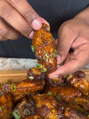 A post by @eatwitzo on TikTok caption: Honey Jerk Chicken Wings! 🐔  There’s something about a good chicken wing that just makes life easier 😂 are you team flats or drums?  Full Ingredient list:  1-2 lb chicken wings 1-2 tsp garlic powder 1-2 tsp onion powder  1-2 tsp black pepper  1-2 tsp smoked paprika  1 1/2-2 1/2 tsp sazon  1/2-1 tsp all spice  1/4-1/2 cup honey  3-4 tbsp butter  3-4 tbsp water  1-2 tbsp jerk marinade  For jerk marinade:  3-4 stalks green onion  1/2 medium onion quartered  3-4 large garlic cloves  1-2 tbsp ginger paste (or fresh ginger)  3-4 thyme sprigs  2-3 scotch bonnets or habanero peppers  1/4 cup soy sauce  1/8-1/4 cup white vinegar  2-3 tbsp brown sugar  2 tbsp browning  1-2 tbsp all spice  1-2 tbsp pepper 1-2 tsp salt (your preference)  1 orange juiced  1 lime juiced  #honeyjerk #wings #eatwitzo 