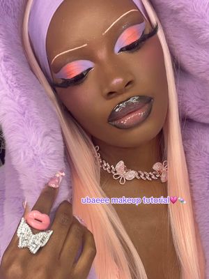 A post by @isabelleikpeme on TikTok caption: little tutorial for this look 💜💗 @Morphe Cosmetics bi liner  @•Milk Makeup• hydro grip eye primer  @ColourPop Cosmetics not a box of chocolates palette  @DanessaMyricksBeauty matte colorfix sundaze + lightwork palette  @rudecosmetics rude sun palette  @Haus Labs by Lady Gaga liquid eyeliner  @Mi Los Angeles queen lashes  #fyp #makeupartist #makeupinspo #eyeshadowlook #eyeshadowinspo #makeuptutorial #eyeshadowtutorial 