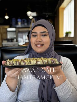 A post by @sharmineats on TikTok caption: Muslim woman owned cafe! @Awafi Cafe Located in 9000 Joseph Campu St, Hamtramck, MI 📍 list of the items and Prices: Mango boba cake $5.99 Sushi crepes $10.99 Pesto sandwich $4.99 Avocado sandwich $4.99 Dubai chocolate strawberry $19.99 Dubai chocolate brownie $9.99  White chocolate macchiato $5.99 Boba berry blast smoothie $7.99 (I also tried their avocado sandwich and Pesto sandwich which didn’t record for some reason, but the Avacado sandwich was 7/10 and the pesto sandwich was a 8/10 😍)  #fyp #awaficafe #dubaistrawberries #dubaicrepes #muslimowned #womanownedbusiness #michigancheck #michigan #pistachiochocolate #foodietiktok #bobacake #sharmineats  