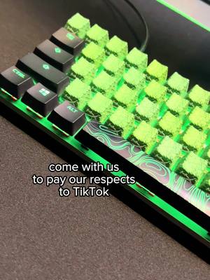 A post by @hyperx on TikTok caption: 😭😭 come cry with us over on IG @HyperX #tiktokfuneral #byetiktok #grasskeycaps #imnotcryingyouare #tiktokseasonfinale 