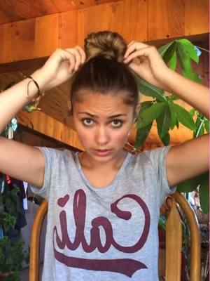 A post by @arianalee99 on TikTok caption: Who remembers my bun tutorial?