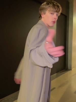 A post by @jack.wright on TikTok caption: trench coat buttoned to the top