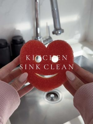 A post by @elysian.living on TikTok caption: asmr kitchen sink clean 🫧 the heart sponge from @Scrub Daddy is so cute 🥰 @Bloom Nutrition #bloompartner #asmr #kitchensink #KitchenHacks #sinkclean #cleaning #satisfying #motivation #deepclean #restock #fyp #cleanwithme 