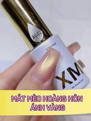 A post by @thanhvy_edana on TikTok caption: MẮT MÈO HOÀNG HÔN ÁNH VÀNG XINGME💅🏻🥰 #matmeohoanghonanhvang #nail #thanhvyedana #thanhvynail #xuhuongnail #mongtay #matmeo #matmeocucquang #xingme #songel 