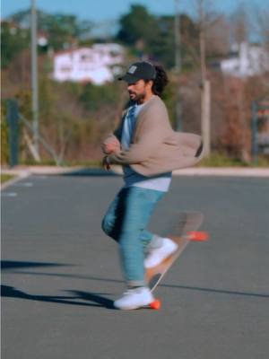 A post by @lotfiwoodwalker on TikTok caption: Staying active on a Sunday morning, doing what I love the most 🛹  #longboarddancing #longboarding #longboardtricks 