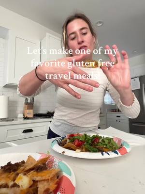 A post by @noglutengabby on TikTok caption: Back to regular scheduled programming with my favorite easy & cheap GF travel meal ♡  #celiac #glutenfree #nachos 