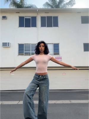 A post by @nawzlisharifi on TikTok caption: guess whose back #OOTD 