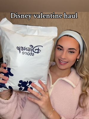 A post by @kristennhorne on TikTok caption: Disney store haul!! Valentines sweater ❤️  Welcome back to tiktok, don’t scare me again 😂🐭 @Disney Parks #disney #disneyworld #disneyland #disneyparks #disneystore 