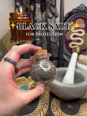 A post by @demurei on TikTok caption: a little black salt recipe 🐍 #witchtok #witch #witchesoftiktok #pagan #blacksalt #magick #magic #protection 