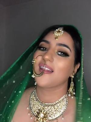 A post by @m.sadoo on TikTok caption: Love 💚 #fy #foru #for #forupage #foruyou #tik_tok #jellewery #indianclothes #bollywoodsong #bollywooddance 