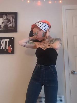 A post by @misspumpkin13 on TikTok caption: monday 🙂  #rockabillystyle #orangehair #pinup #inked #rockabillygirl #pinupgirl #foryoupage❤️❤️ 