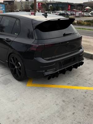 A post by @blvck_mk8r on TikTok caption: #carsoftiktok #car #vw #golf8r #fullblack 