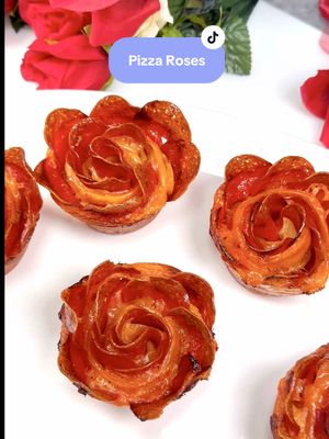 A post by @chefgenevieve on TikTok caption: Pizza Roses! 🍕🌹 for your special Valentine 🥰 #PizzaRoses #ValentinesDay ##ValentineRecipe Pizza Roses Recipe  makes 6  1 sheet pizza crust dough 3/4 cup marinara sauce 6oz shredded mozzarella cheese 6oz pepperoni slices Bake 425°F for 15minutes