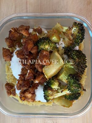 A post by @sharmineats on TikTok caption: Tilapia over rice Bowls 🐟🍚🥦 Tilapia seasonings:  3 tilapia fillets  2 tsp taco seasoning  2 tsp garlic powder  2 tsp onion powder  1 tsp salt  1 tsp cayenne  1 tsp cumin  1 tsp paprika  Broccoli recipe: 1 large head of broccoli  1 tbsp avocado oil  1 tsp garlic powder  1 tsp onion powder  1 tsp cayenne  1 tsp salt  (Roast broccoli at 350°F for 30 minutes) Yogurt sauce:  1 1/2 cup Greek yogurt  1 tsp oregano  1 tsp minced garlic  1 tsp onion powder  1 tsp garlic powder  1 tsp salt  Pilau rice recipe: 2-4 tbsp butter  1 tbsp minced garlic  1 medium onion  1 tsp cumin  1 tsp garam masala  2 tsp salt  1 tsp onion powder  1 tsp garlic powder  1 chicken bullion cube  4 cups water  #fyp #highproteinmeals #tilapiarecipe #healthyrecipes #sharmineats #recipesoftiktok #mealprep #DinnerIdeas 