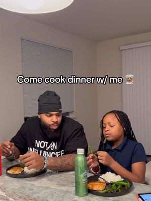 A post by @drewwalls10 on TikTok caption: Come cook dinner w/ me for my daughter 💙 We been working on getting away from Chick-fil-A 😂 I told my daughter if she wants to be strong for basketball and gymnastics she has to eat healthy so far so good. Our favorite thing to eat together is salmon so I made salmon, rice and broccoli. What should I cook next? Healthy meals only 😂 #Lifestyle #SelfCare #foryou #viral #girldad #daddydaugther 