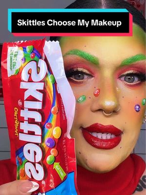 A post by @ronyayvonne on TikTok caption: Replying to @Katie💕  Skittles Choose my Makeup 🔴🟢🟡🟠🟣 #candymakeup #makeupchallenge 