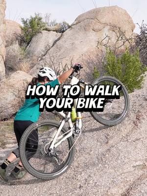 A post by @specializedbicycles on TikTok caption: @Jess The Maker how to walk your mountain bike 💀 #humor #mtb 