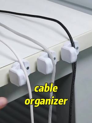 A post by @magibyte0 on TikTok caption: say goodbye to messy desktop,you need a cable organizer #setup #kitchen #desksetup #organize #roomorganization#foryou #fyp #goodthing #goodthings 