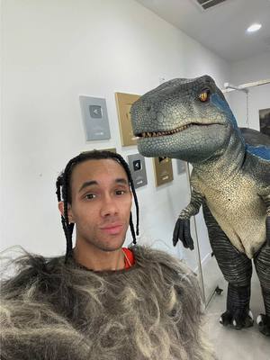 A post by @qtube on TikTok caption: I Surprised My Friend With A REAL LIFE Dinosaur 😂 @watchmyhaircut #dinosaur #jurrasic #surprise #fyp 