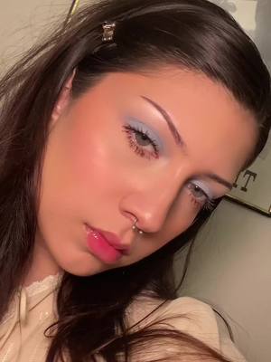 A post by @neoncowboy on TikTok caption: The most perfect simple eye look using @Ami Colé lid joy in Los Angeles🦢💙