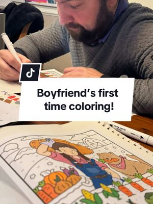 A post by @simswithjackie on TikTok caption: the story of how i discovered my boyfriend is better than me at coloring 😂❤️ #coloringbook #adultcoloringbook #alcoholmarkers #coloring #cocowyo #markers 