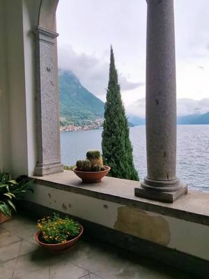 A post by @blogsognoitaliano on TikTok caption: The botanical garden of Villa Monastero is always enchanting, even on cloudy days. Its lush greenery, vibrant blooms, and peaceful lake views create a magical atmosphere in any weather. #varenna #italia #lakecomo #italy 