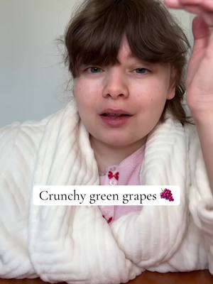 A post by @emily_loves2eat on TikTok caption: ASMR 🍇 #foryoupagе #fyp #asmr #crunchy #crunchyasmr #grapes #eating #snack 