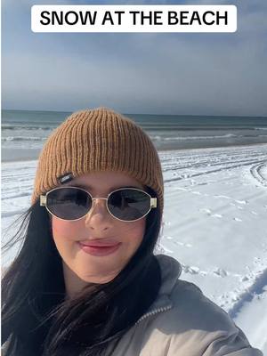 A post by @sierrakatel on TikTok caption: I heard Jamaica got snow too? What’s happening 😂 #snowatthebeach #northcarolina #winter 