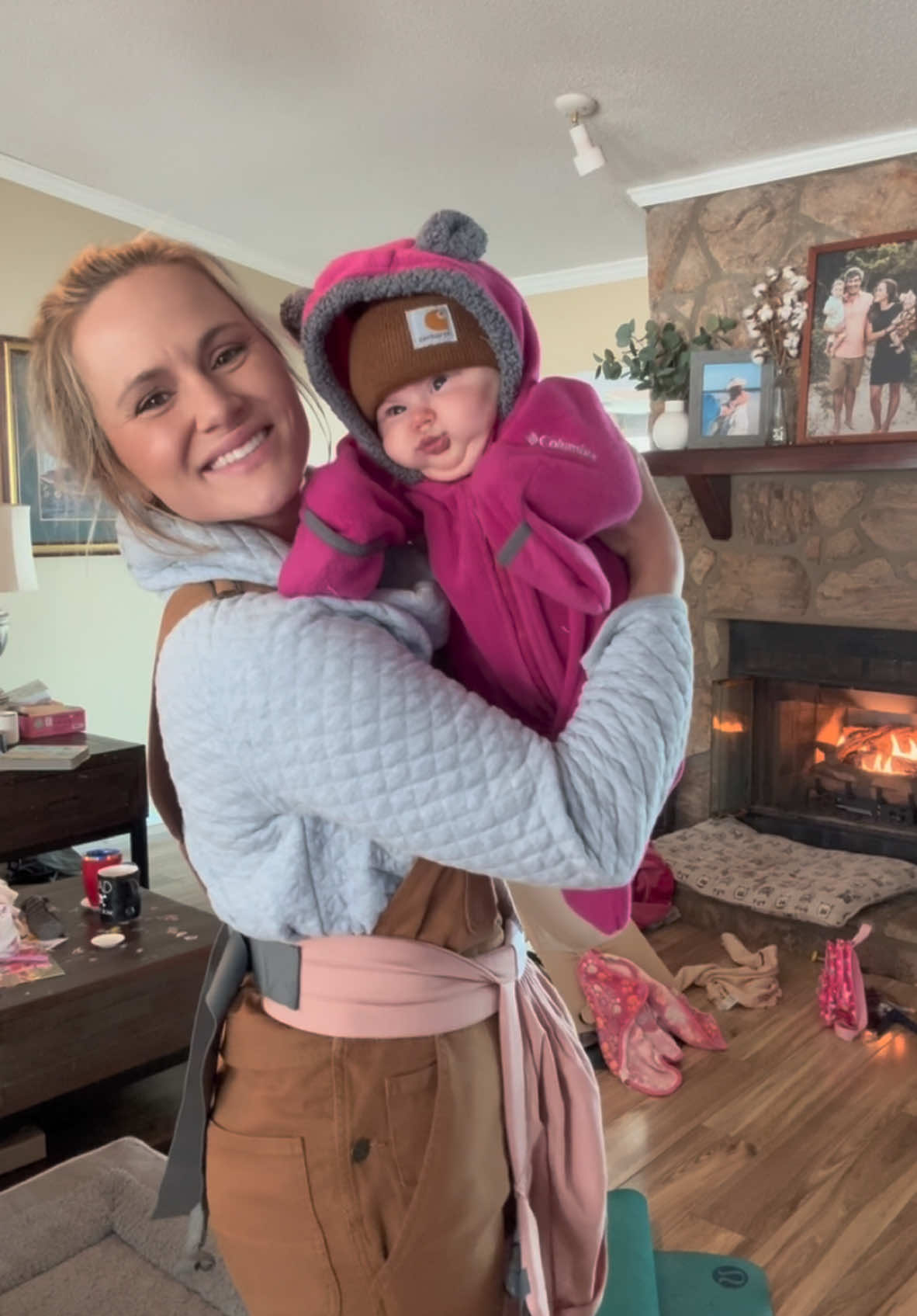 A post by @justbeinjordan_ on TikTok caption: What a snow day! ❄️✨ Moo and Zeus love the snow and the silkie chickens hate it 😆 #snowstorm #snow #snowday #family #momlife #babywearing #farmchores #farmchoresinthesnow 