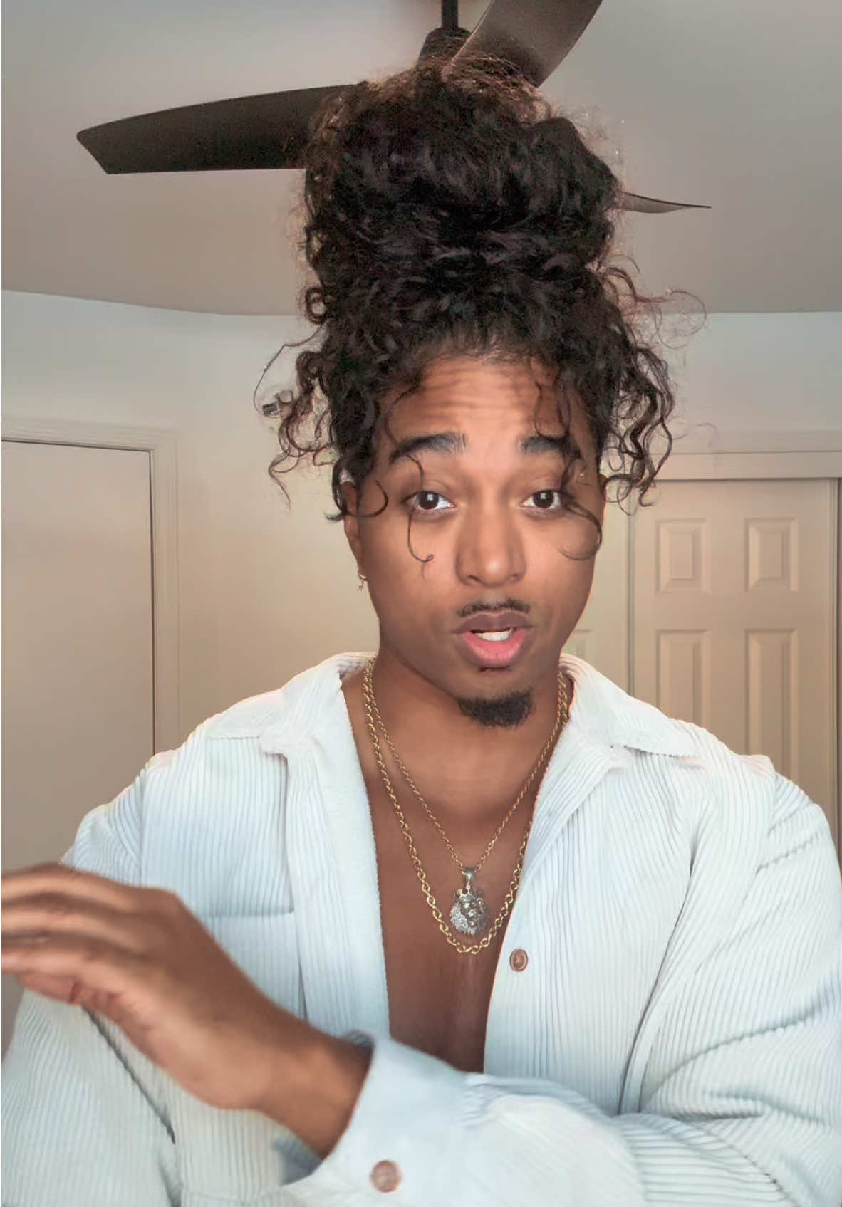 A post by @giofilipinohair on TikTok caption: My Hair Be To Heavy For A Single Hair Tie 😂 It Needs Support! #gioswave #manbun 