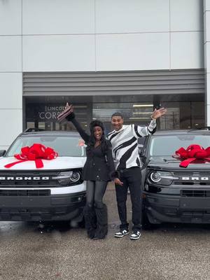 A post by @the_fav_auntie on TikTok caption: So nice had to buy it twice 🤍🖤 Are you team White or Black Bronco? #newcar #bronco #hisandhers #mrandmrs #marriedlife 