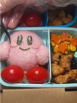 A post by @momentswithmoriah on TikTok caption: Anyone remember seeing my first Kirby video? 🥹💕 #kirby #bento #沖縄 #okinawa 