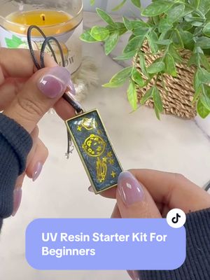 A post by @sprinklecheerfulness on TikTok caption: UV Resin Starter Kit For Beginners. This started kit includes so many items to turn into gifts for yourself or others (or even sell) from earrings, necklaces, keychains! I did use my black mica powder that I already had, and that’s the beauty of resin you can make so many beautiful colors and combinations. Please also be aware of safety precautions of resin, I was wearing gloves in a well ventilated area and had a mask on as well. Some people don’t use a mask and some do.  #resin #uvresin #uvresincrafts #resinforbeginners #resintips #uvresinart #resinart #resinpour 