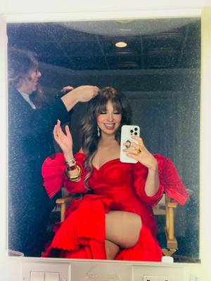 A post by @thalia on TikTok caption: Lady in red ❤️💃 #YoMeLoBusqué @angelesazulesmx 