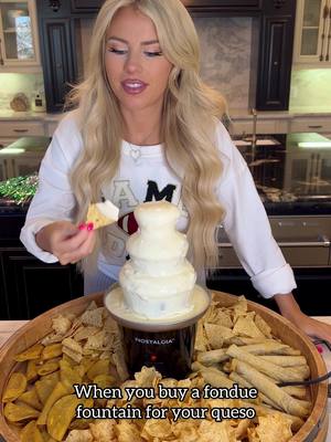 A post by @macy.blackwell on TikTok caption: A cute and fun game day idea for your queso! Make a queso fountain!🧀 Delicious with chips and more! Endless possibilities for dippers! I added taquitos and mini tacos!  #superbowlfood #superbowlparty #gamedayeats 