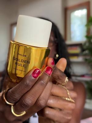 A post by @bonitravo on TikTok caption: trying @‌@Phlur Fragrances NEW Golden Rule perfume for the first time ⭐ #ad #phlur #perfumetok #perfumetiktok #phlurpartner #phlurfragrance