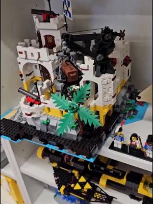 A post by @bricksiej on TikTok caption: I love adding #LEGO sets to shelving didplays