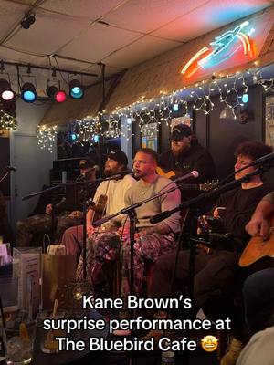 A post by @cmt on TikTok caption: “Backseat Driver” live at @The Bluebird Cafe 🫶 #kanebrown #countrymusic #thehighroad 