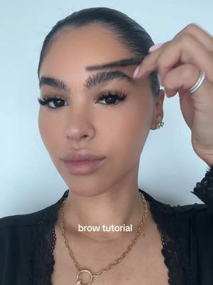 A post by @amayaliacolon on TikTok caption: brow tutorial 🫶🏽  @Anastasia Beverly Hills brow wiz shade dark brown  @got2bUSA brow & edge gel  @Haus Labs by Lady Gaga concealer shade 30