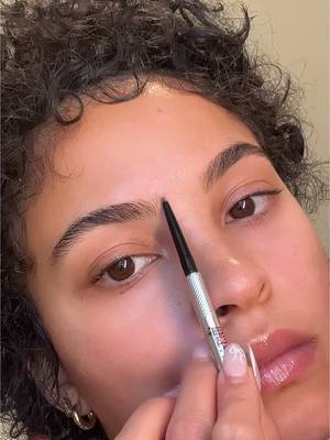 A post by @ririsimpson on TikTok caption: How did I just discover him ?!  Exfoliate @Murad Skincare  Tanning drops (sugar cookie season)+tanning stick @DOLCE GLOW  Highlighter @Rare Beauty  Brow pencil @Benefit Cosmetics  Mascara @Too Faced #makeup #song #skin #toofaced #rarebeauty #dolceglow #tanningstick #benefit #murad 