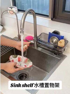 A post by @hongguo99 on TikTok caption: #Kitchenware - Sink Shelf #sinkdrainingshelf  #Amazon #Popular #Kitchenware #kitchentools #Sink  #kitchen 