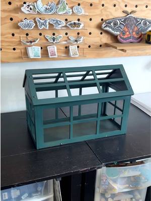 A post by @ystreetstudio on TikTok caption: Let me know alllll of your ideas!! #miniatures #miniature #greenhouse #eclecticdecor 