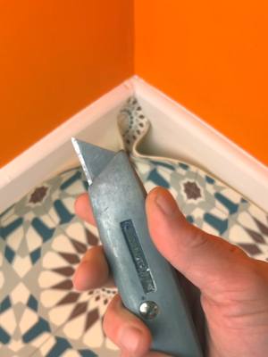 A post by @tipcentric on TikTok caption: Corner Cutting Perfection #tipcentric #worksmarternotharder #tips #tipsandtricks #workshop #LearnOnTikTok #DIY #tools #homemaintenance #flooring #flooringinstaller