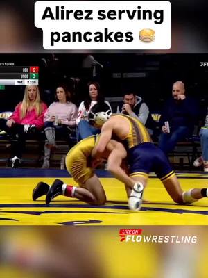 A post by @flowrestlingtv on TikTok caption: NCAA Champ Andrew Alirez dominates with a 30 second pin during Northern Colorado’s dual against California Baptist 💪 #ncaawrestling 