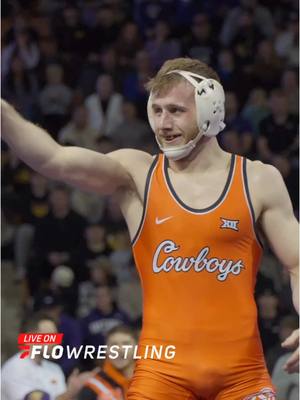 A post by @flowrestlingtv on TikTok caption: #13 Caleb Fish of Oklahoma State gets a big UPSET victory in overtime against #4 Ryder Downey of Northern Iowa 🤯 Watch Oklahoma State vs Northern Iowa Live on FloWrestling now #NCAAWrestling 