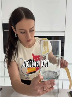 A post by @sabina.mxxx on TikTok caption: Action DIY ❤️🤗 für nur 5€. Eine schöne Idee als Tischdeko oder einfach als Vase 🥰 viel Spaß beim nachmachen!  #DIY #actiondiy #actionhack #doityourself #dekoration #einrichtung #selfmade #kerzenständer #haubau #interiordesign #fyp #viral_video 