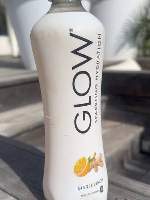 A post by @makeupmag77 on TikTok caption: #glow up from the inside out 🌊✨ A sip of beauty, a view of paradise 🤩🌴@GLOW Beverages  🙌🏽🙌🏽 #glowhydration #glowpartner #drinkglow #letsglow 